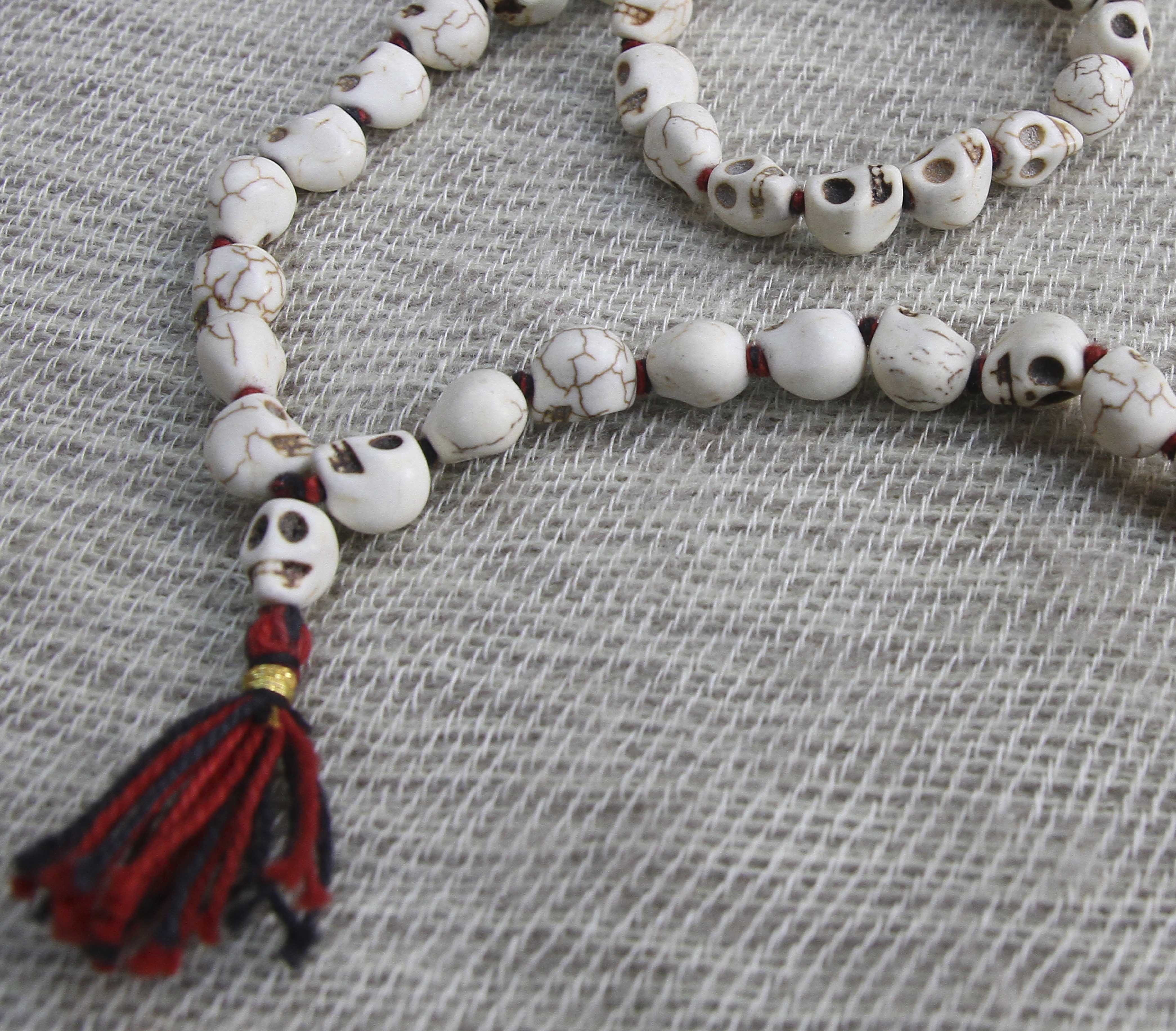 Handcarved Rejin Skull Conch Mala